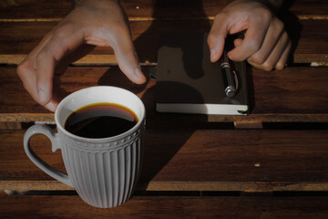 person holding a cup of coffee