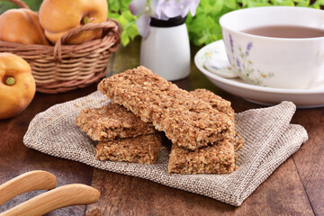  Crunchy granola bars on a wooden background   