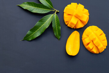 Tropical fruit, Mango on dark background.