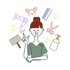 犬のトリミングをする道具とトリマーの女性