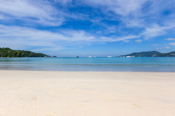 Fototapeta na wymiar Beautiful nature of the Andaman Sea and white sand beach in the morning at Patong Beach.
