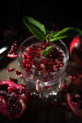 Pomegranate cocktail moody and dark backround