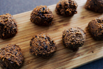 plant-based food, vegan meatballs made of black beans mushroom mince and textured vegetable protein on cutting board