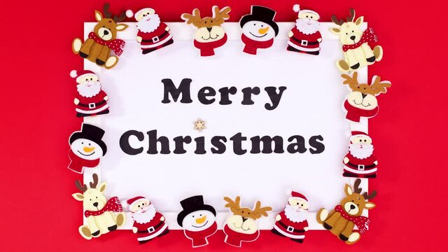 Christmas stickers moving on frame with Merry Christmas text. Stop motion