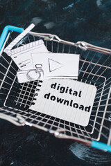 creative content sold online, photo and video digital downloads icon in shopping basket