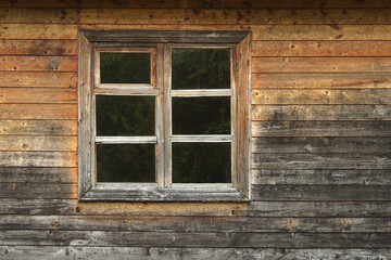 Aged Wooden wall with window Close up. Wall background.