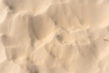 Top view of Nature beach sand texture in summer sun
