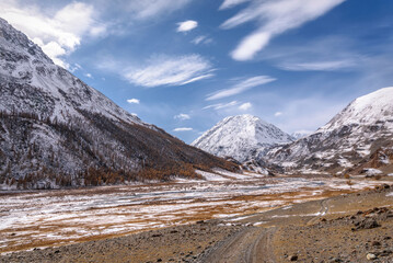 road mountains snow autumn sky