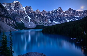 Alpine lake in mountains at night. Iconic Canadian Moraine lake in Banff National Park. Alberta....