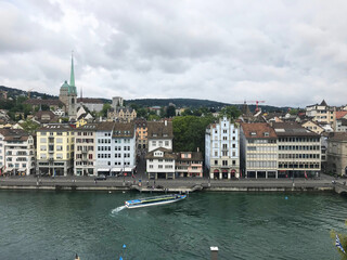 lake view near tower of Saint Peter and Fraumünster Church in Zurich, Swiss, Switzerland
