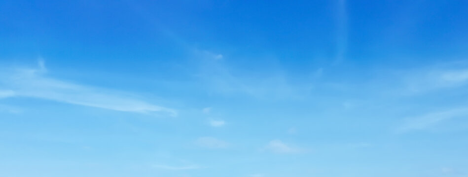 Horizon banner of tranquil blue sky with smooth cloud