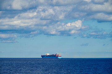 Seascape from cruiseship or cruise ship liner with sky and horizon and ocean  at sea while cruising