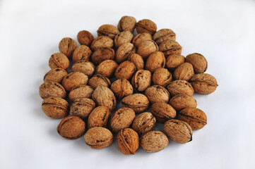 A bunch of walnuts on a white background isolated