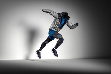 Fototapeta na wymiar Abstract View Of Mannequin, wearing sports apparel sprinting on a white background. 3d Rendering.