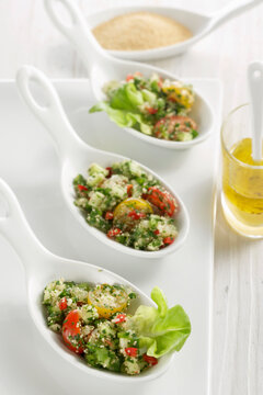 Tasting spoons of amaranth tabouleh