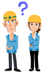 疑問を持つ建築現場作業員男女の全身

