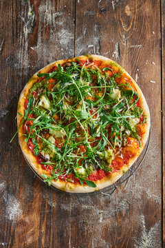 Pizza Caprice with arugula