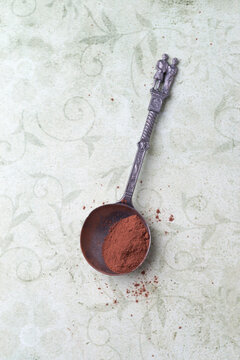 Spoonful of cacao powder