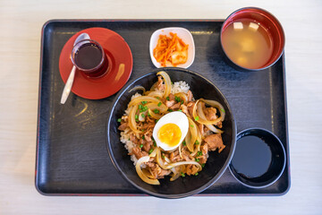 rice and stir fried pork with Korean spicy sauce (Gochujang) or Bulgogi, Korean popular menu from movies