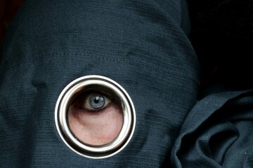 close up portrait of a person in a hole