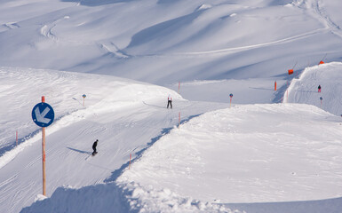 Winter landscape in the Alps. Mayrhofen sports region in the Zillertal. Ski slopes in the background of mountains