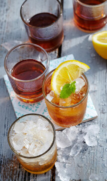 Homemade beer liqueur with corn schnapps, vanilla, crushed ice and lemon