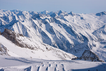 Winter landscape in the Alps. Mayrhofen sports region in the Zillertal. Ski slopes in the background of mountains