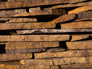 Stack of Porphyry Irregular Stones. Flagstone for Paving, Flooring and Facade.