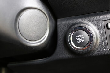 Engine start button, Press the button to start the car automatically. Car start stop system with finger pressing the button.