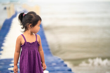 Cute little girl walking on Modular Plastic Floating Dock