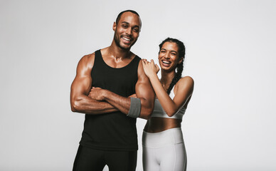 Monochrome fitness portrait of fit couple