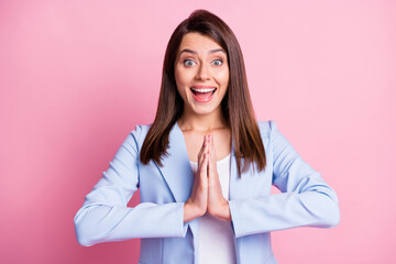 Portrait of young attractive excited happy positive businesswoman ask beg hold hand isolated on...