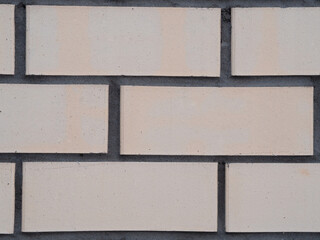 background wall made of bricks beige and gray cement