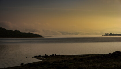 A peaceful sunrise on a Cantabrian lake