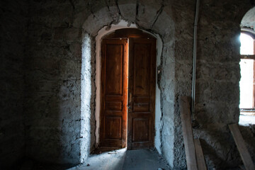 abandoned buildings with stone walls