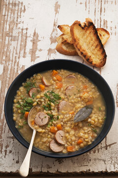 Split pea and lentil soup with sausage dumplings