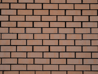 background wall made of bricks rede and gray cement