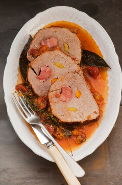 Stuffed Pork Roulade In A Vegetable Stock