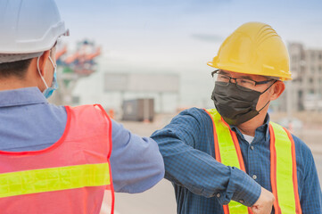 Two people new normal Hello do not Shake hand Social distancing, Engineer shake hand no touch...