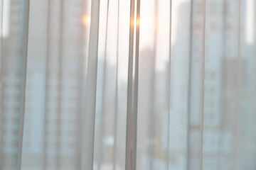 Fototapeta premium White curtains and morning sunlight