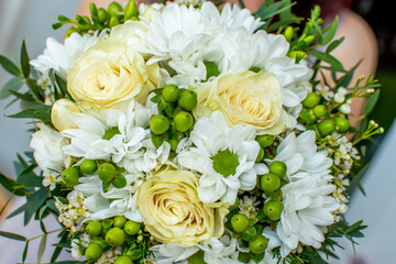 white, yellow and green wedding bouquet of flowers