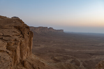 Tourists gather at Edge of the World escarpment near Riyadh, Saudi Arabia