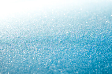 Blue snow sparkling festive background. 	