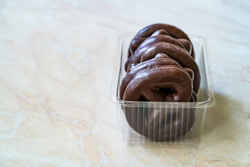 Chocolate Covered Gingerbread Cookies Heart and Star Shaped in Plate in Plastic Box Package or Container.