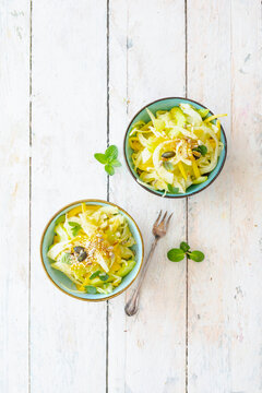 Fennel salad with mango, cucumber, mint and seeds (vegan)