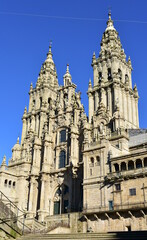 Fototapeta na wymiar Cathedral, facade view from Praza do Obradoiro with blue sky. Santiago de Compostela, Galicia, Spain, Europe.