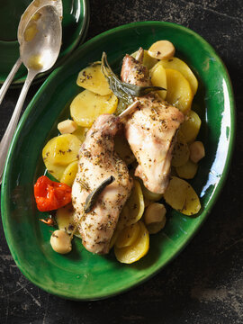 Rabbit with potatoes and garlic