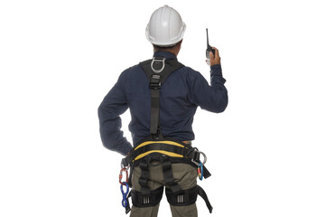 Obraz premium Workers standing with hand holding walkie-talkie wearing safety helmet and equipment safety harness on white background with clipping paths