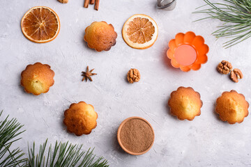 Delicious fragrant vanilla cupcakes on a light background. A place for text, a view from above. Recipes.