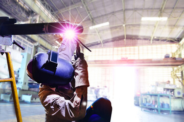 Workers Welding process on steel pipe by Tig used gas argon in factory for pipe fabrication in...